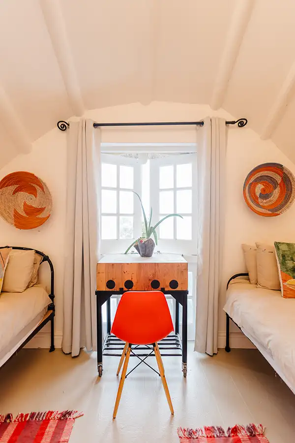 two beds and a chair