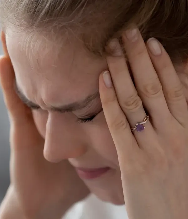 liberty-mental-health-woman-hands-face-page