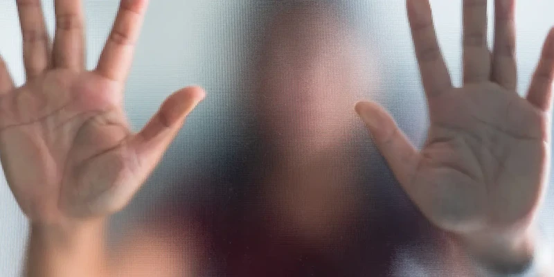 person hands front window