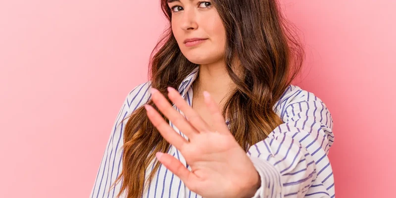 woman making stop gesture