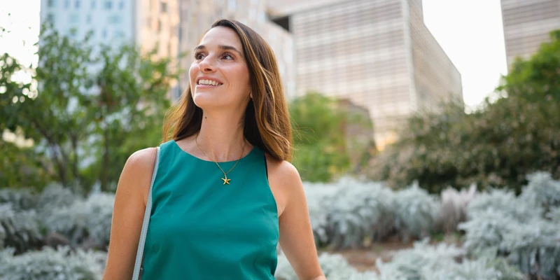 woman in green dress in the park